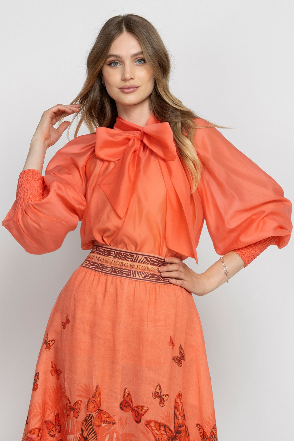 BOHEMIAN PAPAYA LYOCELL BLOUSE WITH PUFF SLEEVES AND TIE-FRONT COLLAR - ESSENTIALS